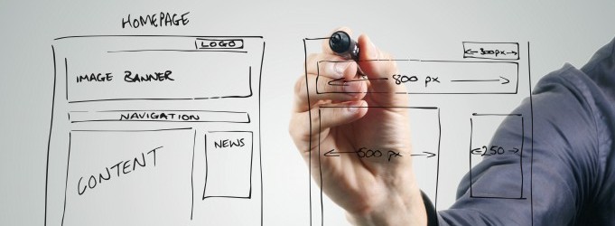 designer drawing website development wireframe